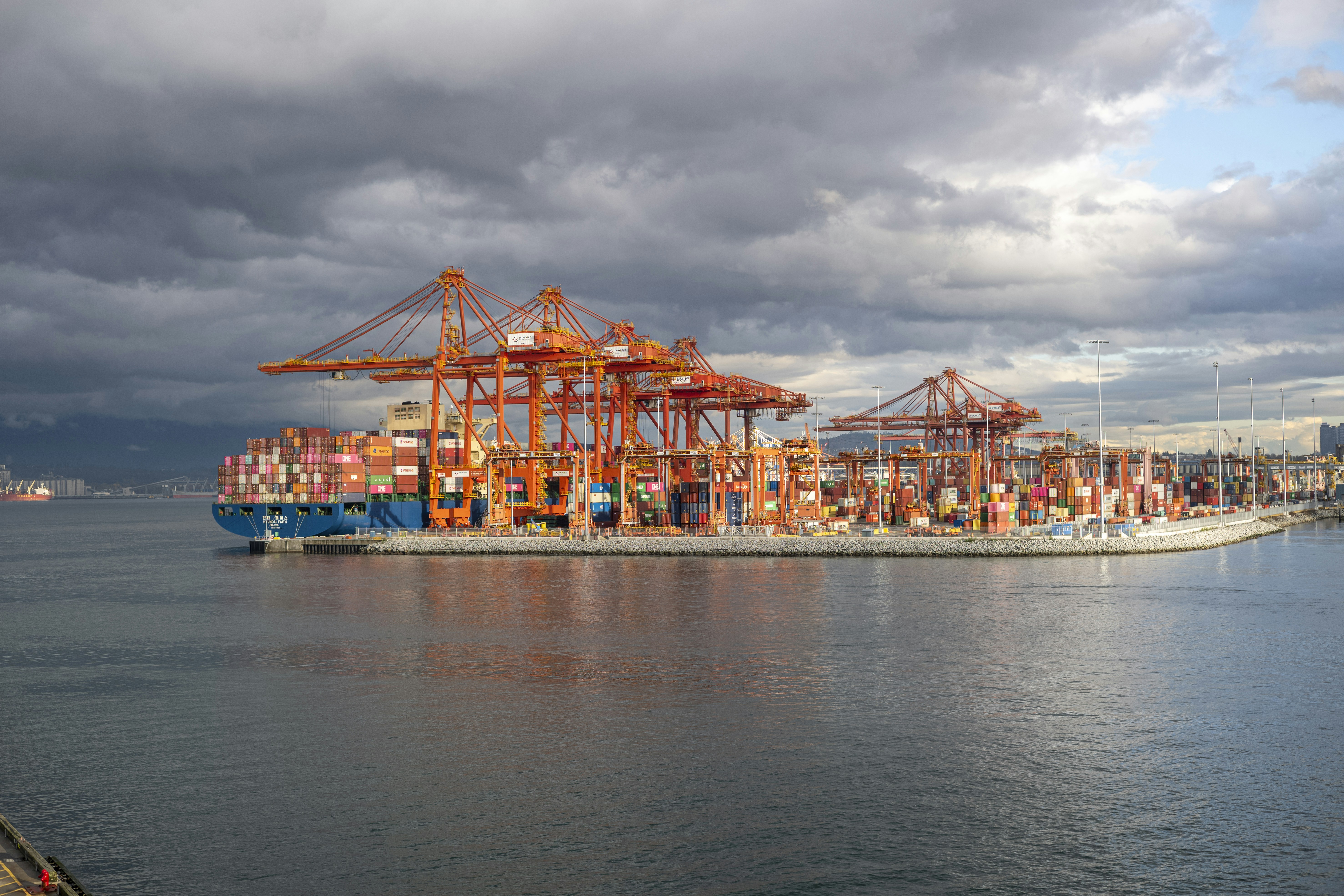 a large cargo ship in the middle of a body of water