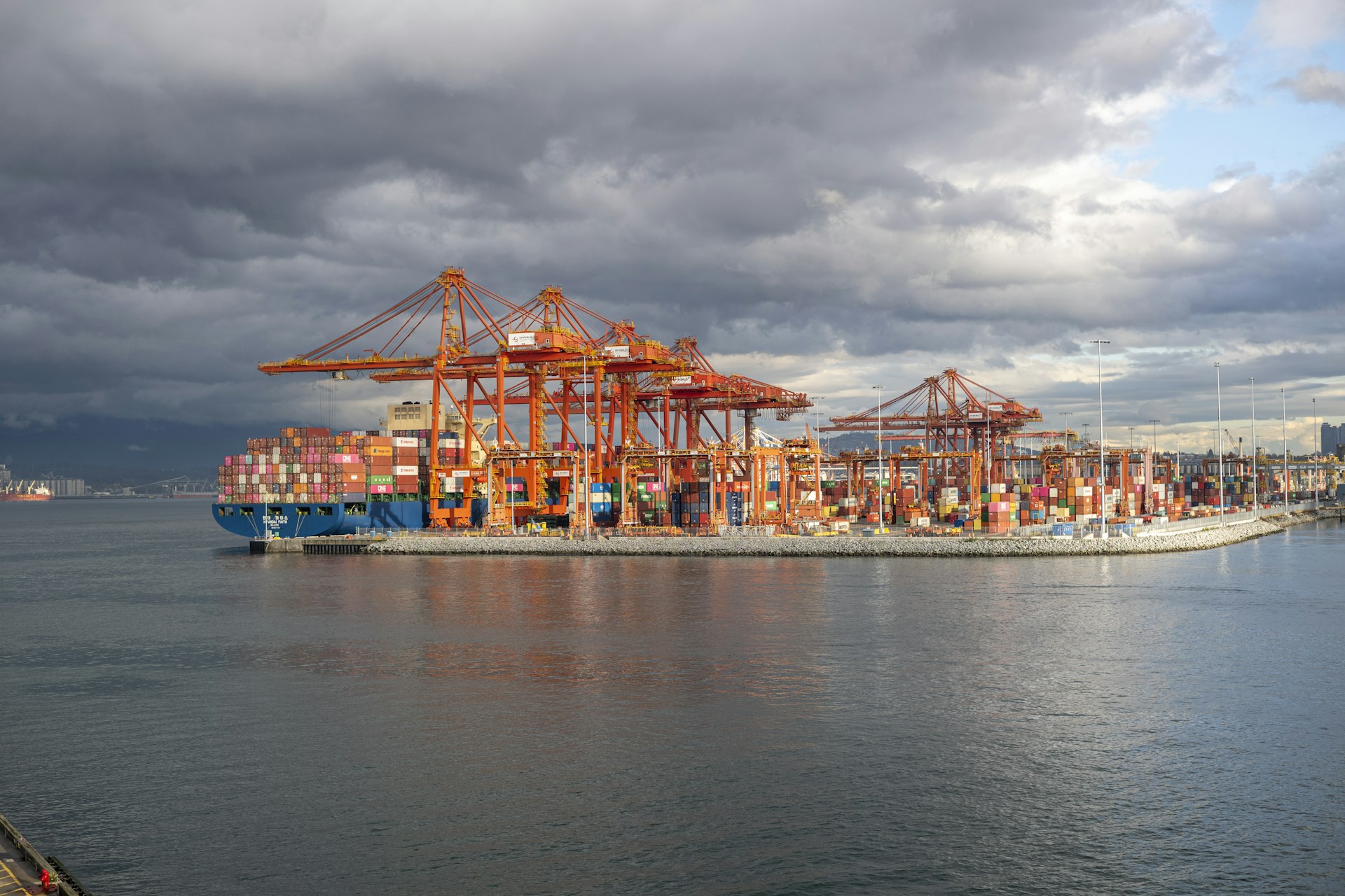 a large cargo ship in the middle of a body of water