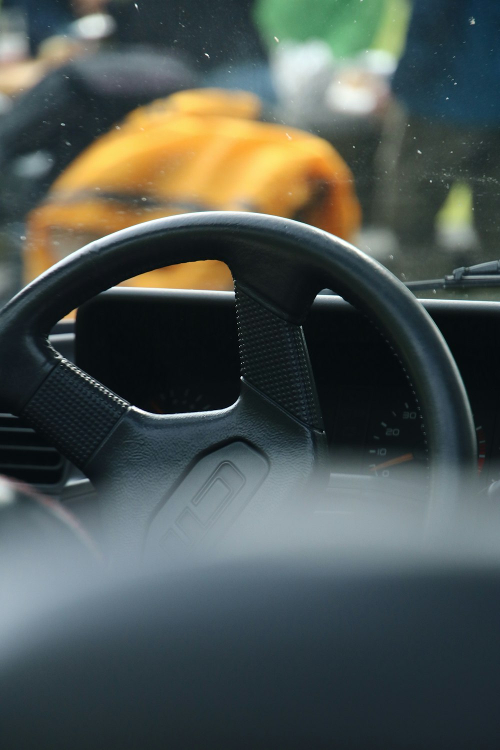 a close up of a steering wheel on a vehicle
