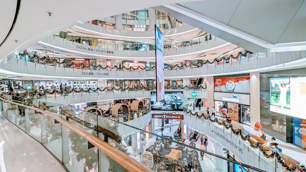 a mall filled with lots of people walking around