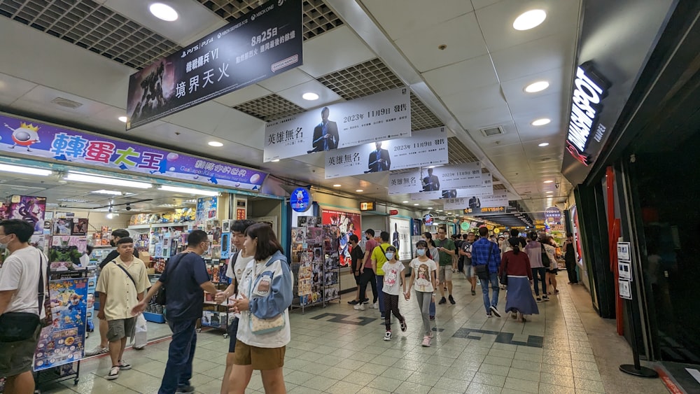 a group of people standing around a store