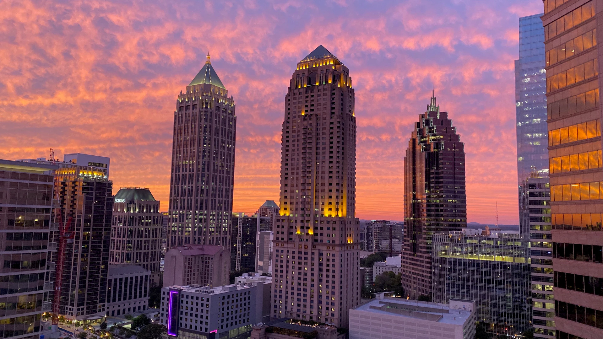 woman wearing yellow long-sleeved dress under white clouds and blue sky during daytime