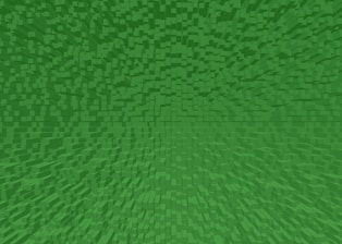 A geometric pattern composed of numerous small green cubes extending in a three-dimensional space. The cubes are tightly packed and vary slightly in shade, creating a sense of depth and complexity.