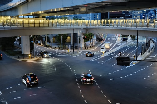 Smart city intersection with intelligent traffic lights and connected vehicles.