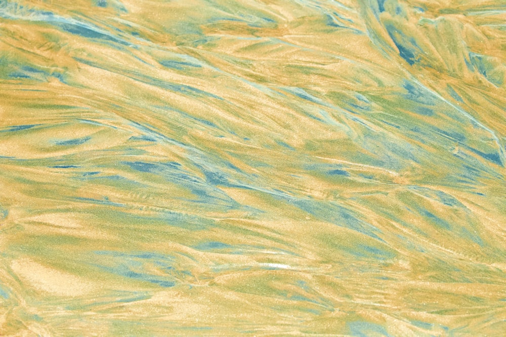 a close up of a yellow and blue background