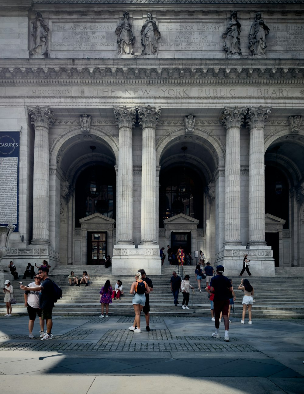 a group of people standing in front of a building