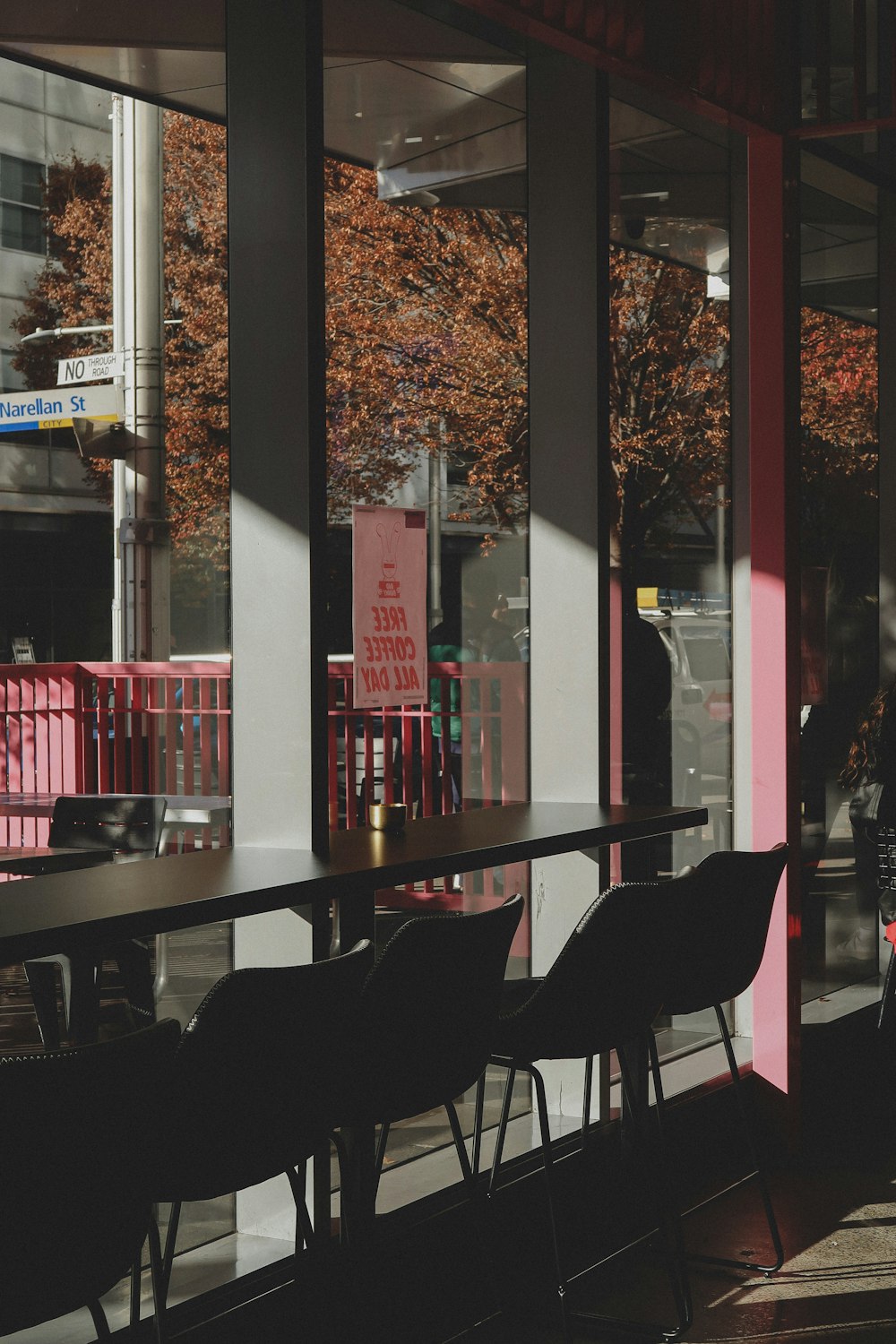 a row of chairs sitting in front of a window