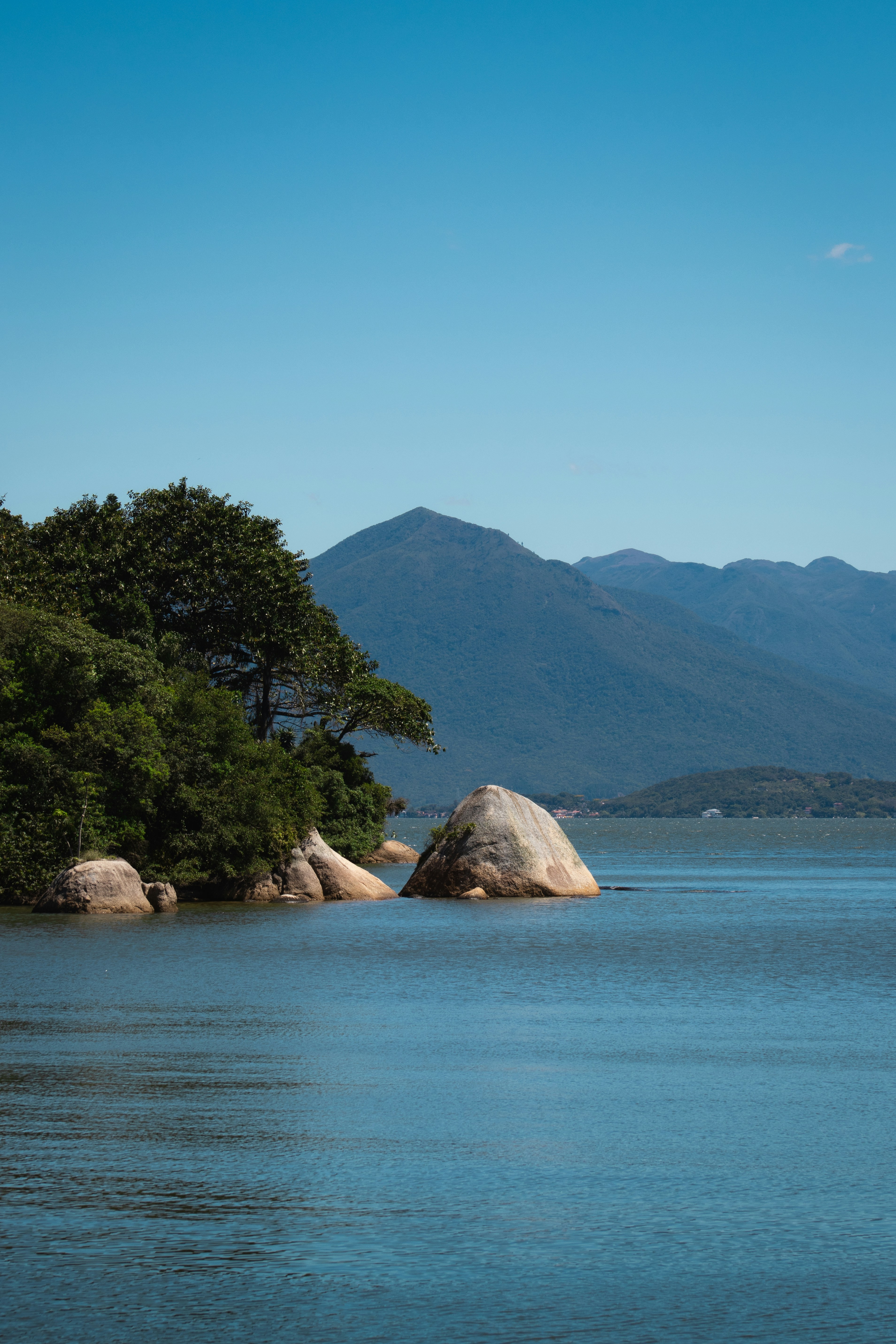 a large body of water surrounded by mountains