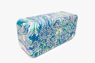 A serene blue wall art piece showcasing abstract designs.