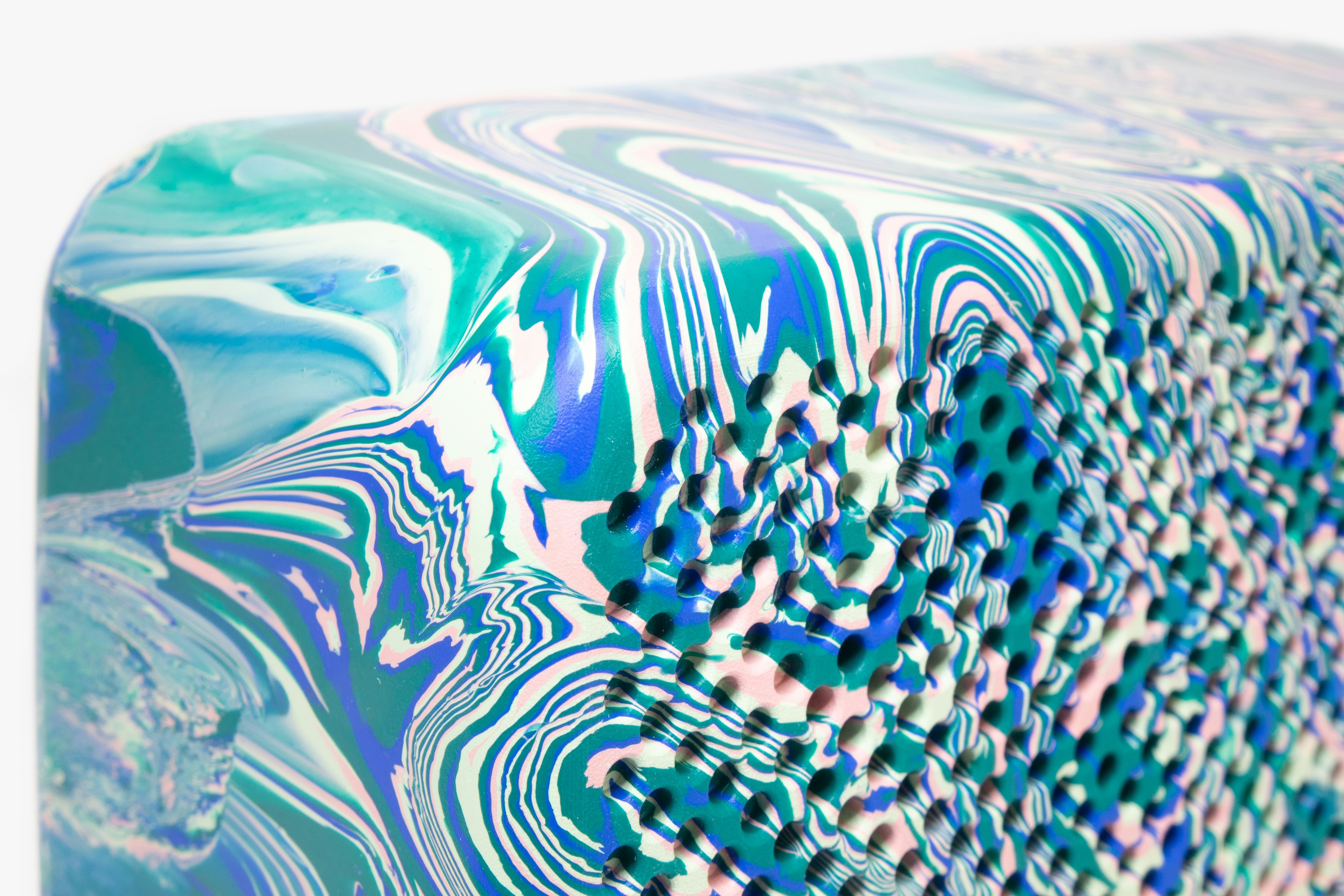 a close up of a blue and white object