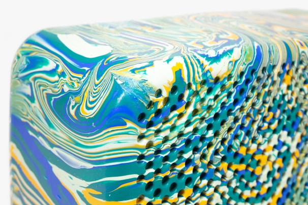 Close-up of a warm terracotta jali block with intricate geometric patterns casting soft shadows.