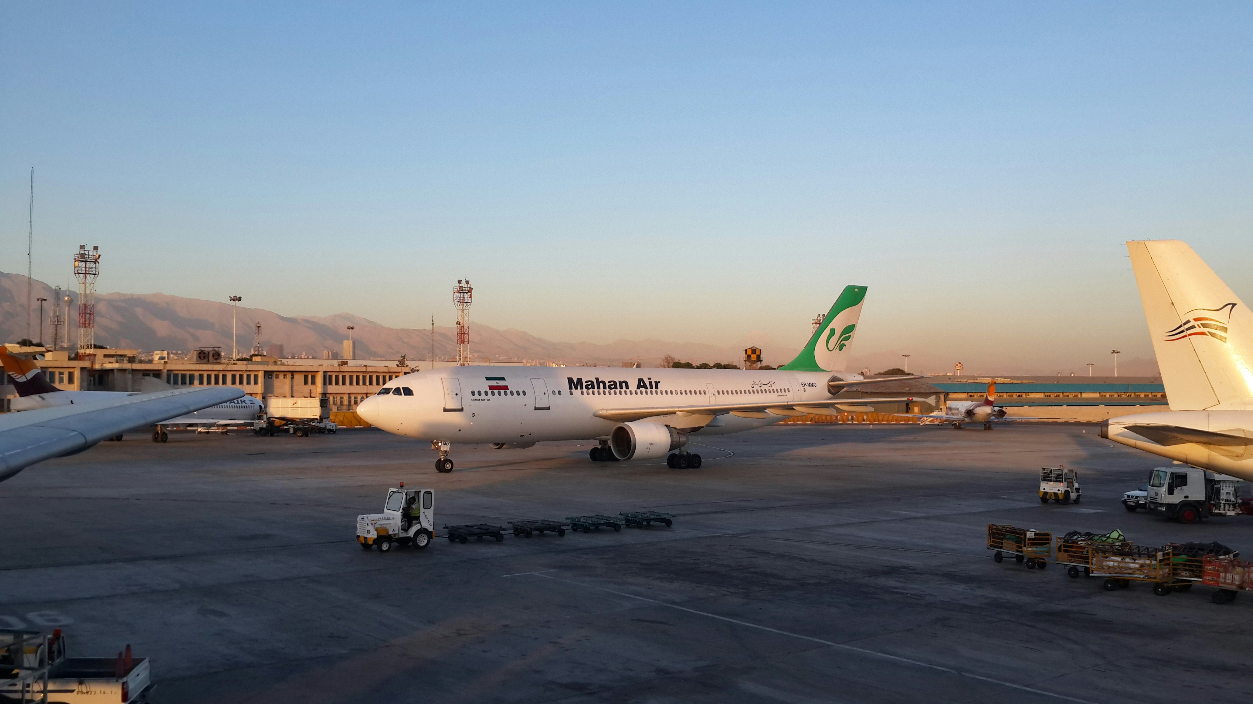 a large jetliner sitting on top of an airport tarmac, mahan air airbus a300 600 series at tehran mehrabad airport, iran