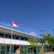 A school playground decorated with red and white banners and flags for Independence Day.
