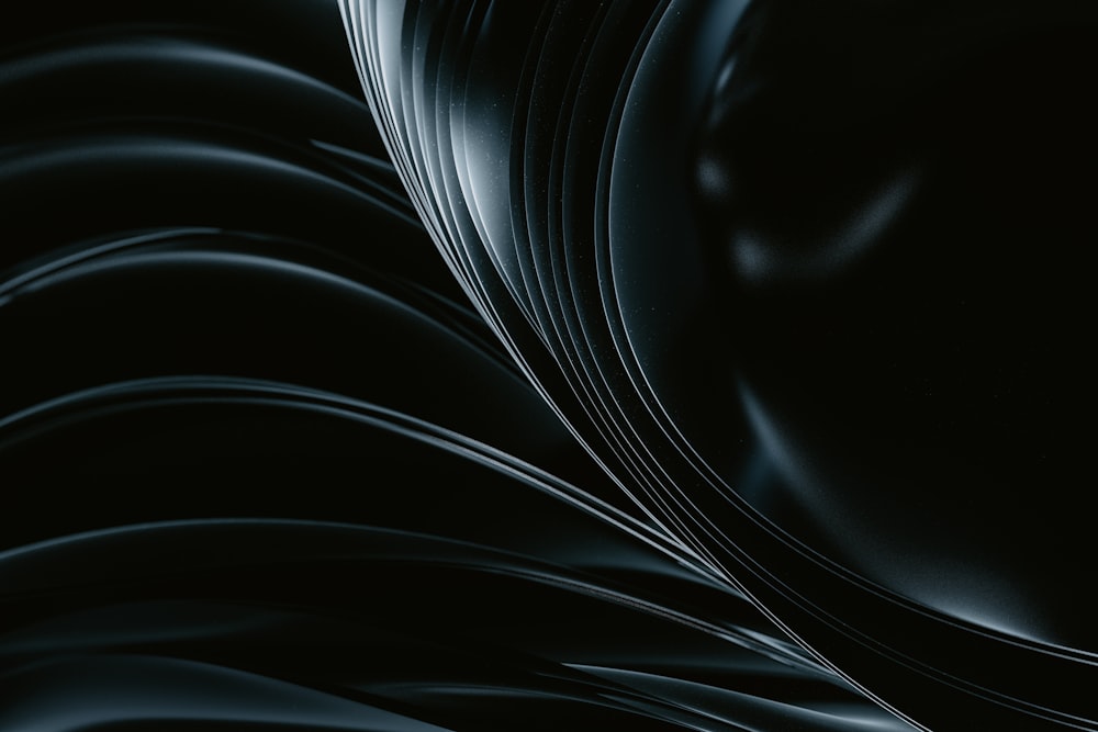 an abstract black background with wavy lines