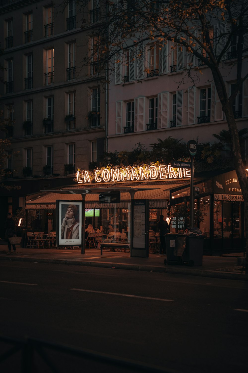 a building with a lit up sign on the front of it