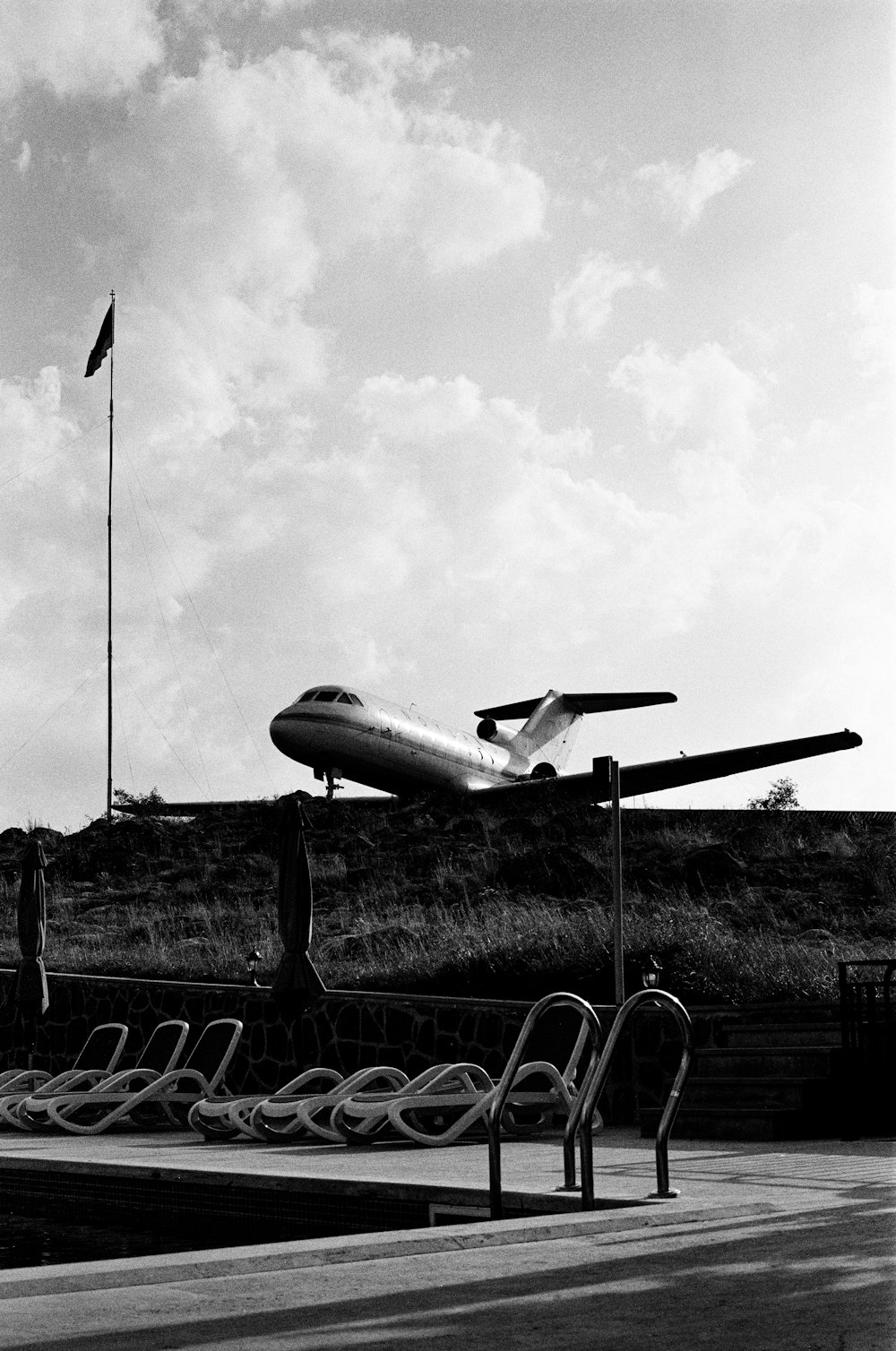 a plane sitting on top of an airport tarmac