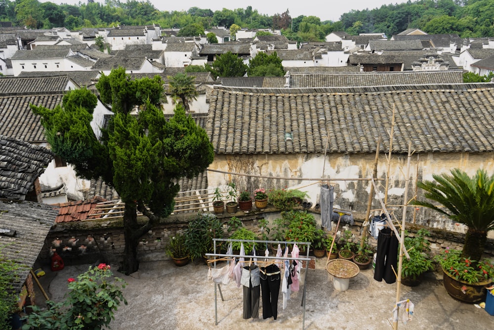 a view of a rooftop with clothes hanging out to dry