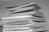 a stack of white blocks sitting on top of a table