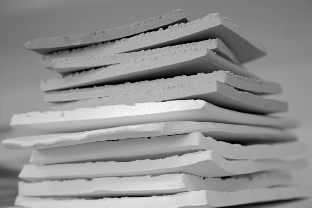 a stack of white blocks sitting on top of a table