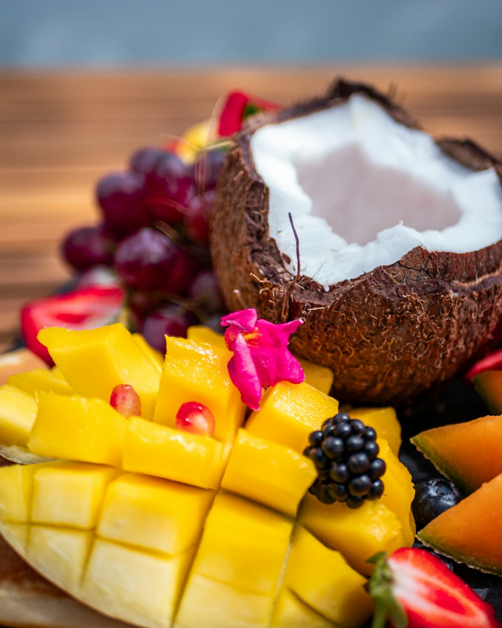 a close up of a plate of fruit on a table