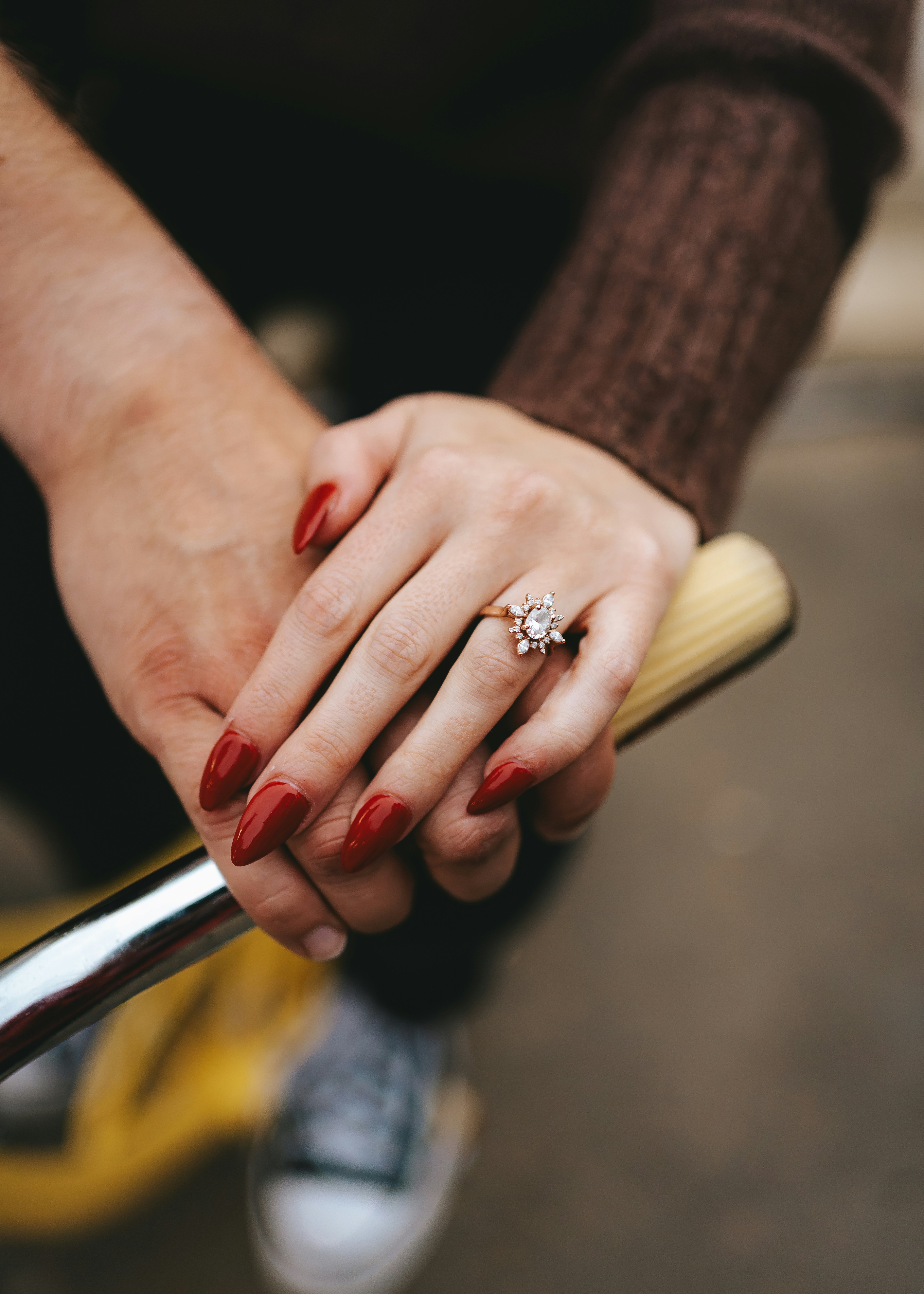 a close up of a person holding a bike handle