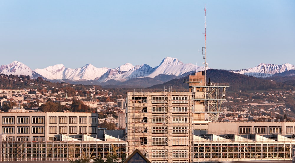 a view of a city with mountains in the background