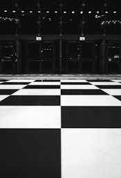 a black and white checkered floor in a building