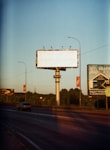 a billboard on the side of the road