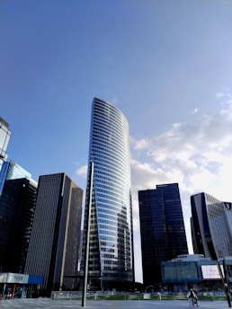 a group of tall buildings sitting next to each other