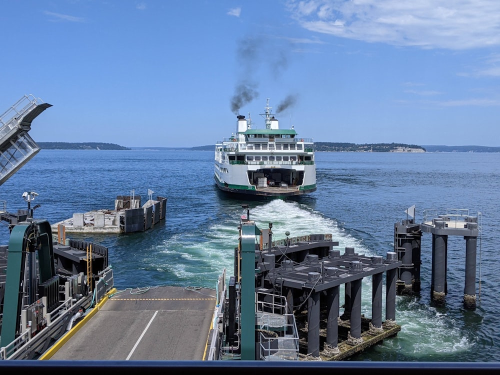 a large boat traveling across a large body of water