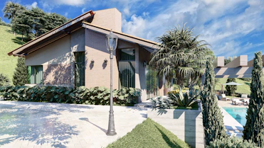 a house with a pool in front of it