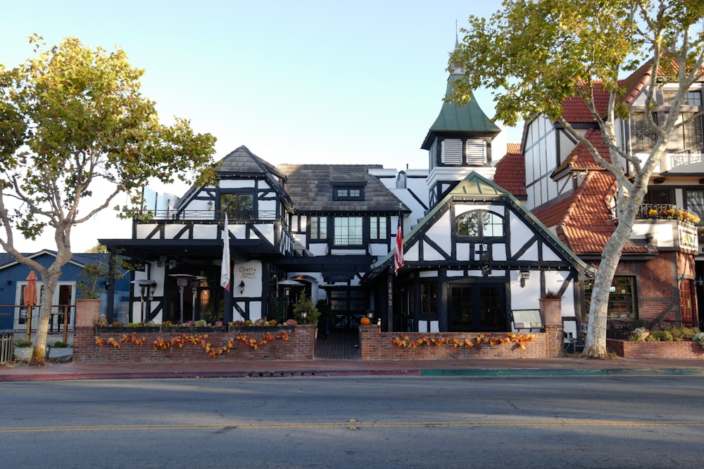 a large house with a flag on the front of it