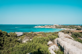 A scenic view of Búzios coastline with clear blue waters.