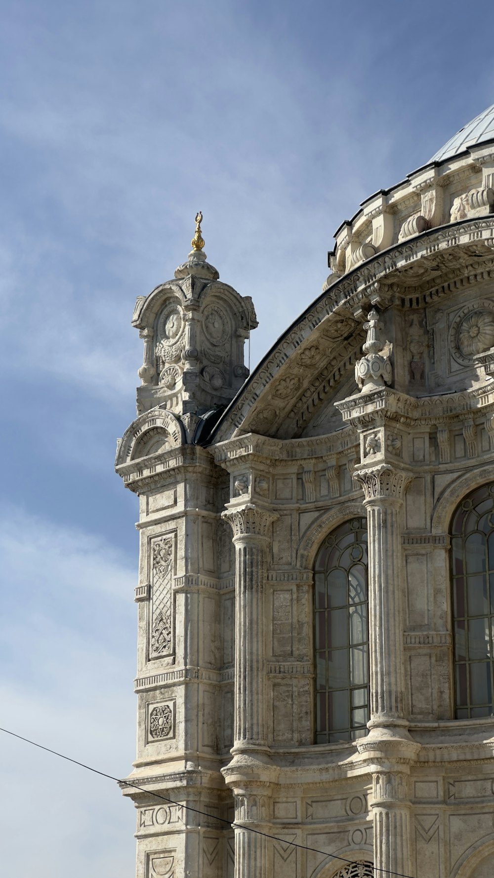 a large building with a clock on the top of it