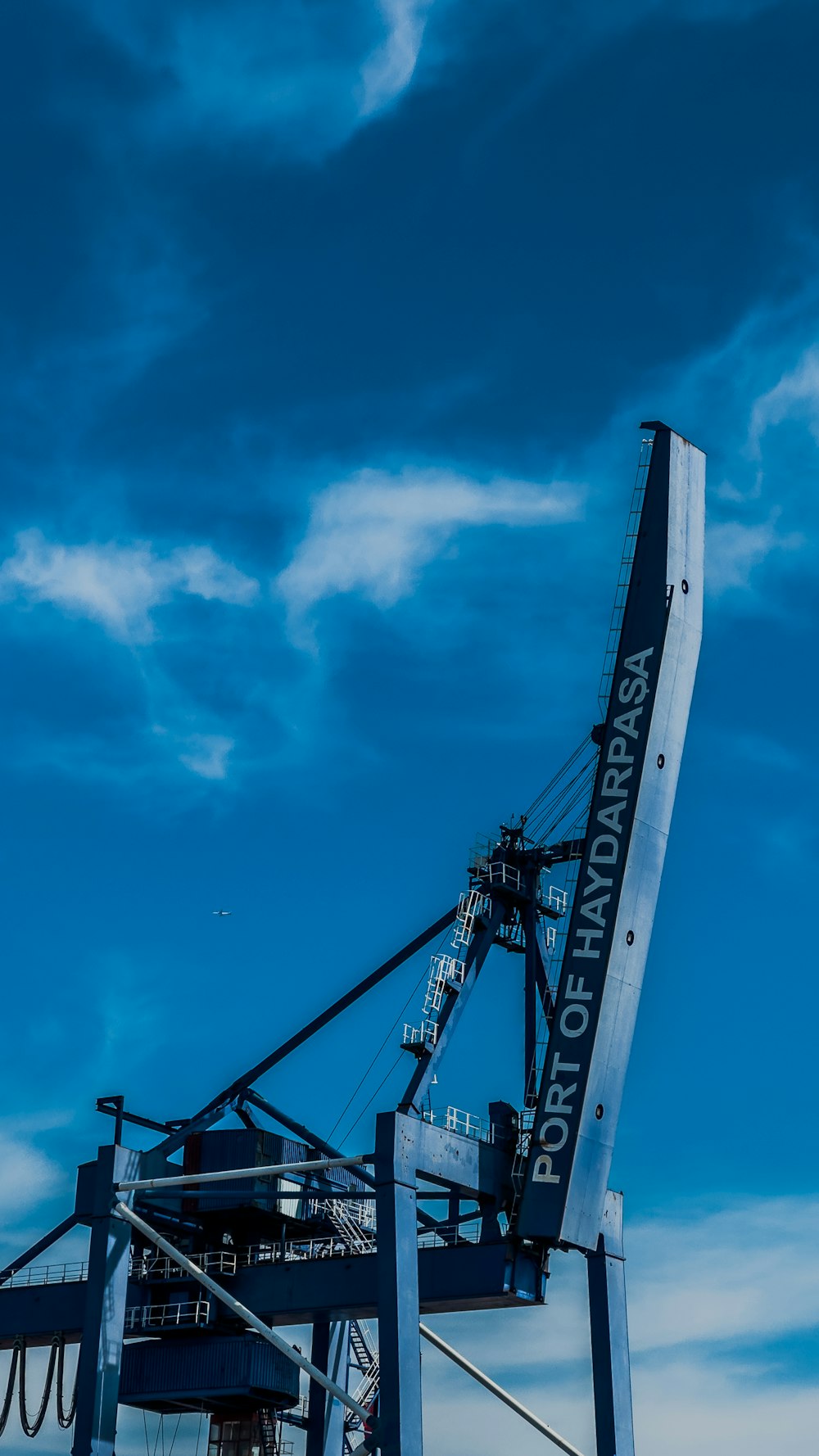 a large crane sitting on top of a metal structure