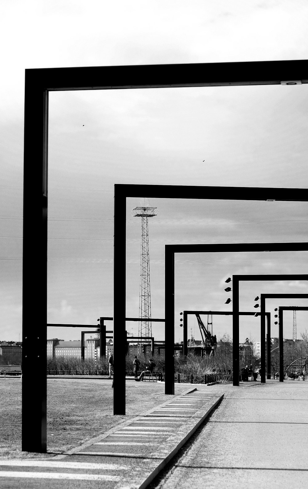 a black and white photo of an empty parking lot