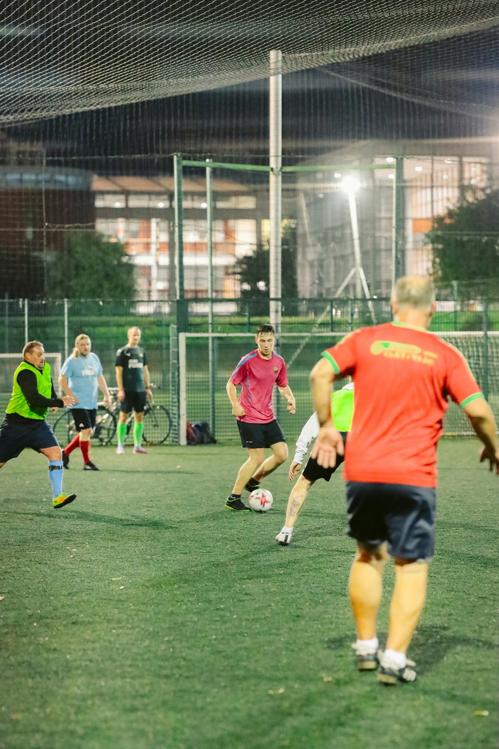 a group of young men playing a game of soccer