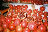 Baskets filled with juicy pomegranates ready for sale.