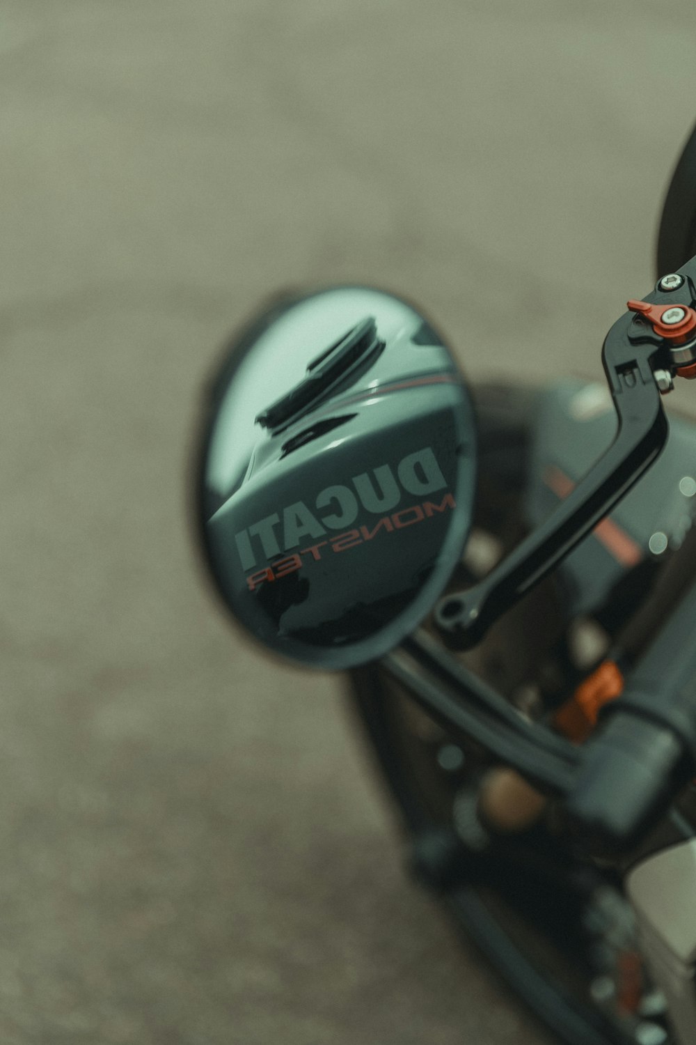 a close up of a motorcycle mirror on a motorcycle