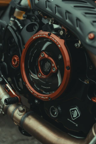 Close-up of high-quality motorcycle and car parts neatly arranged, highlighting product authenticity.