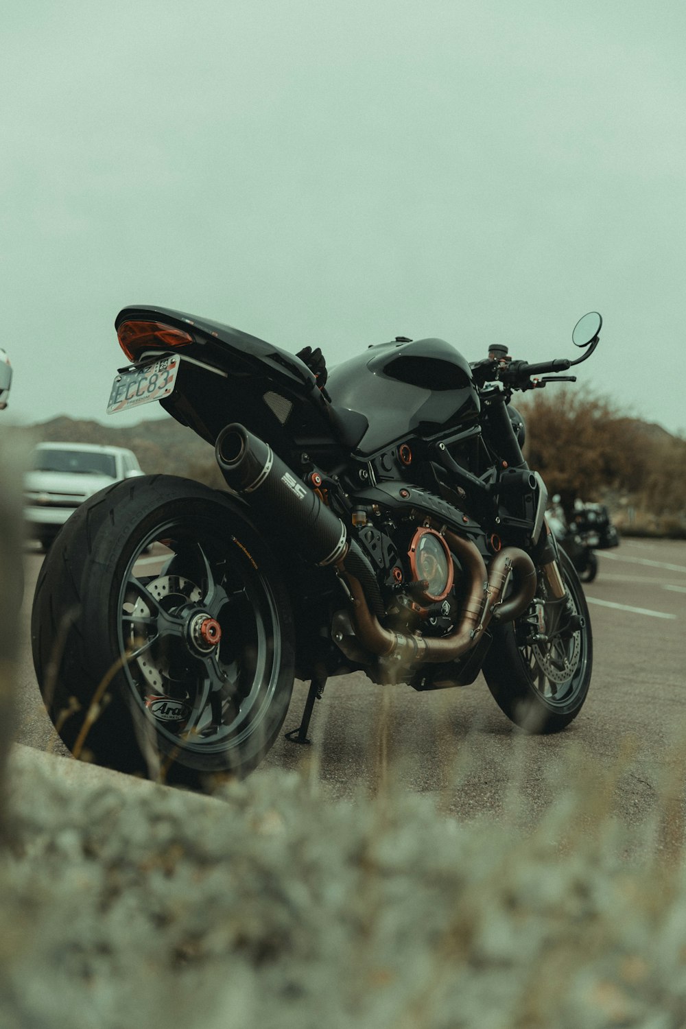 a motorcycle parked on the side of the road