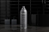 Close-up of industrial aerosol products showcasing premium packaging details.