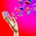 A wooden mannequin hand holding a smartphone, with heart and like icons emerging from the screen against a bright pink and red background. The icons appear three-dimensional and colorful, symbolizing social media engagement.