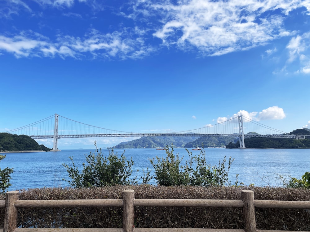 a view of a bridge over a large body of water