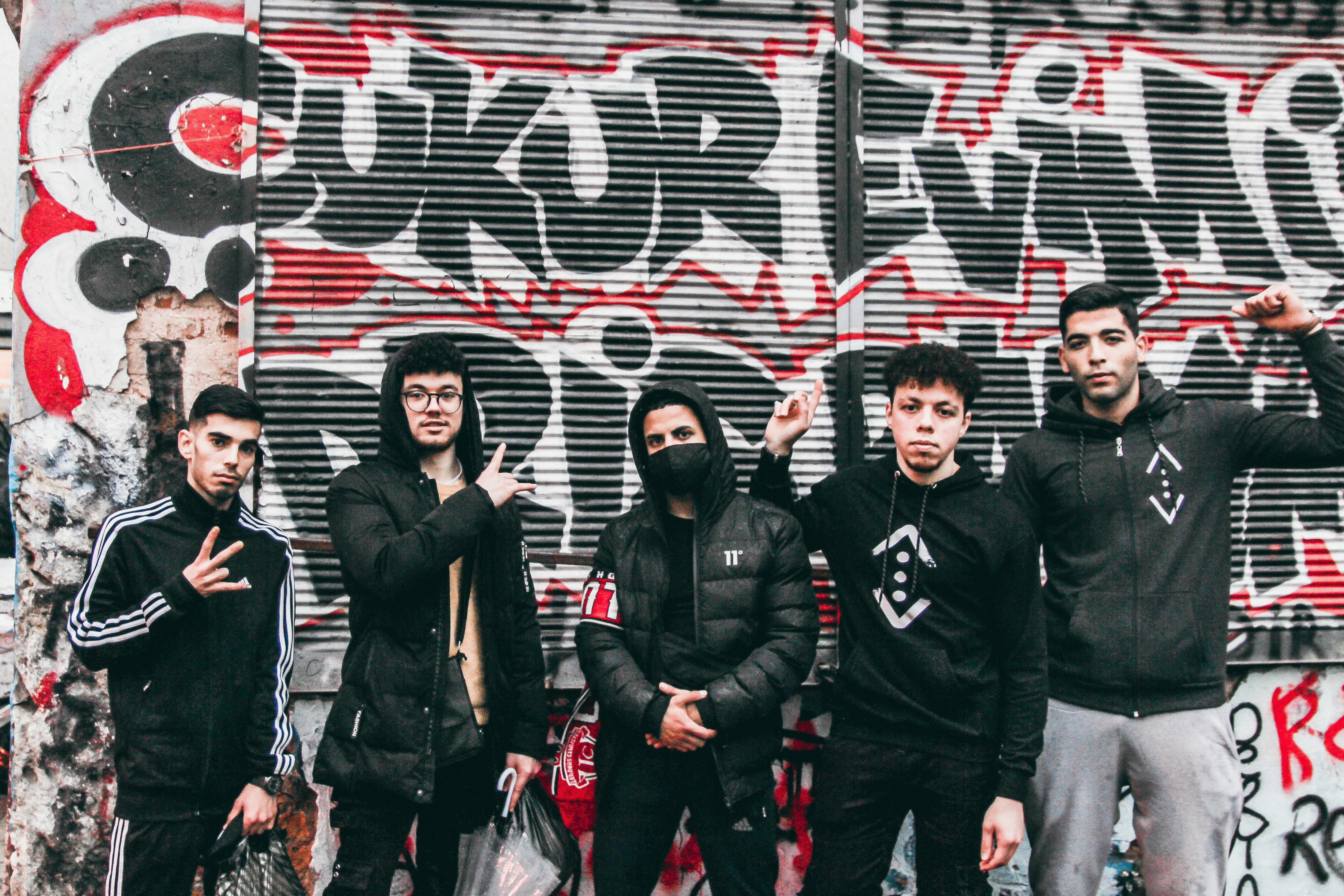 a group of young men standing next to each other