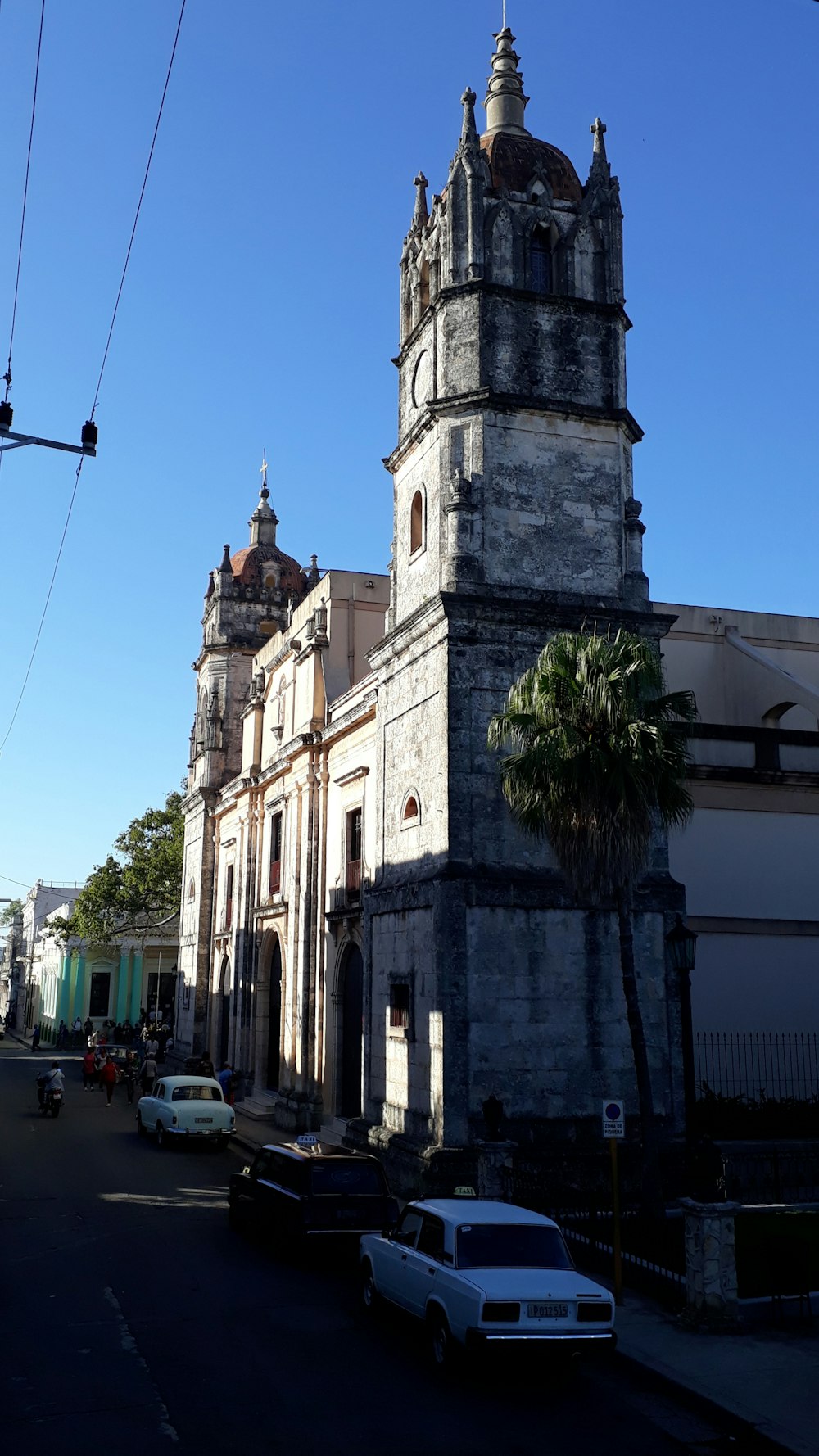 a large building with a tower and a clock on it