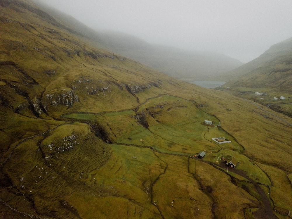 an aerial view of a valley in the mountains