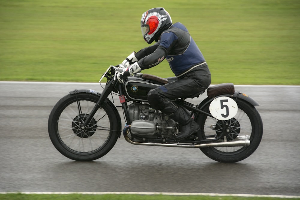 a person riding a motorcycle on a race track