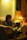 Happy man reading a book in a cozy living room