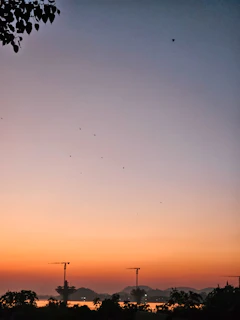 A serene Jaipur skyline at dawn with soft blue and green hues reflecting the calm and trust of Nishchay insurance advisory.